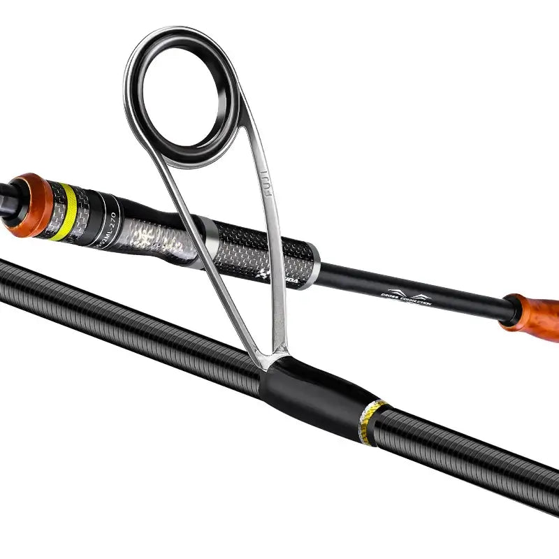 HISTAR Hacker carbon fiber fishing rod with FUJI guides and ergonomic handle for smooth casting and durability.