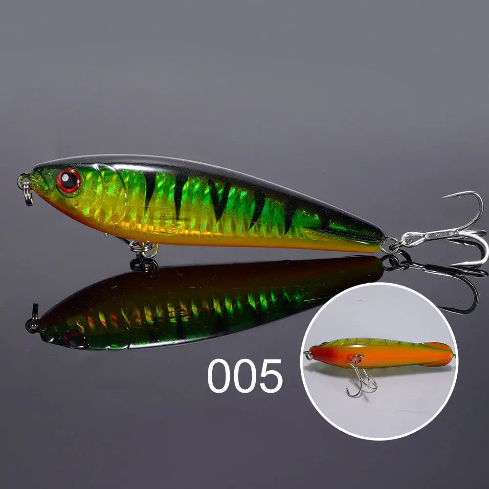 NOEBY 95S Stickbait Wobbler 95mm 25g green and orange body, ideal for saltwater fishing and mimicking live bait.