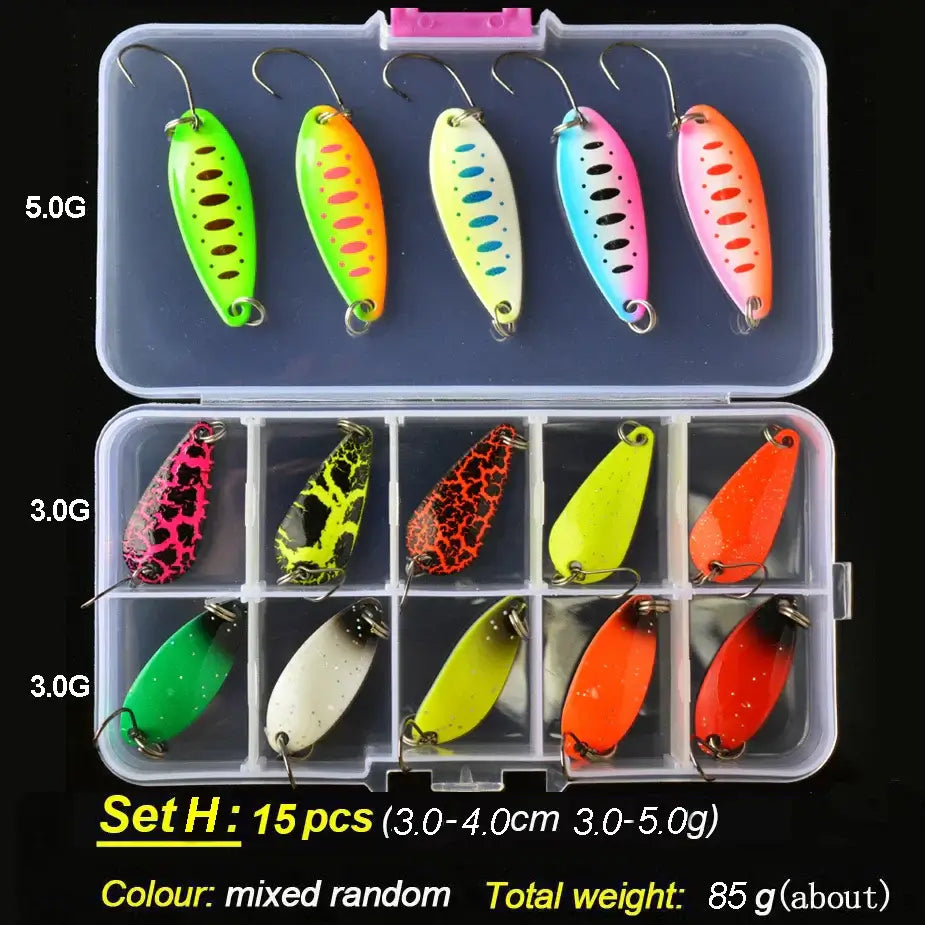 TOMA Trout Spoon Lure Set with 15 mixed color lures in a clear box, weighing 85g, ideal for freshwater fishing.