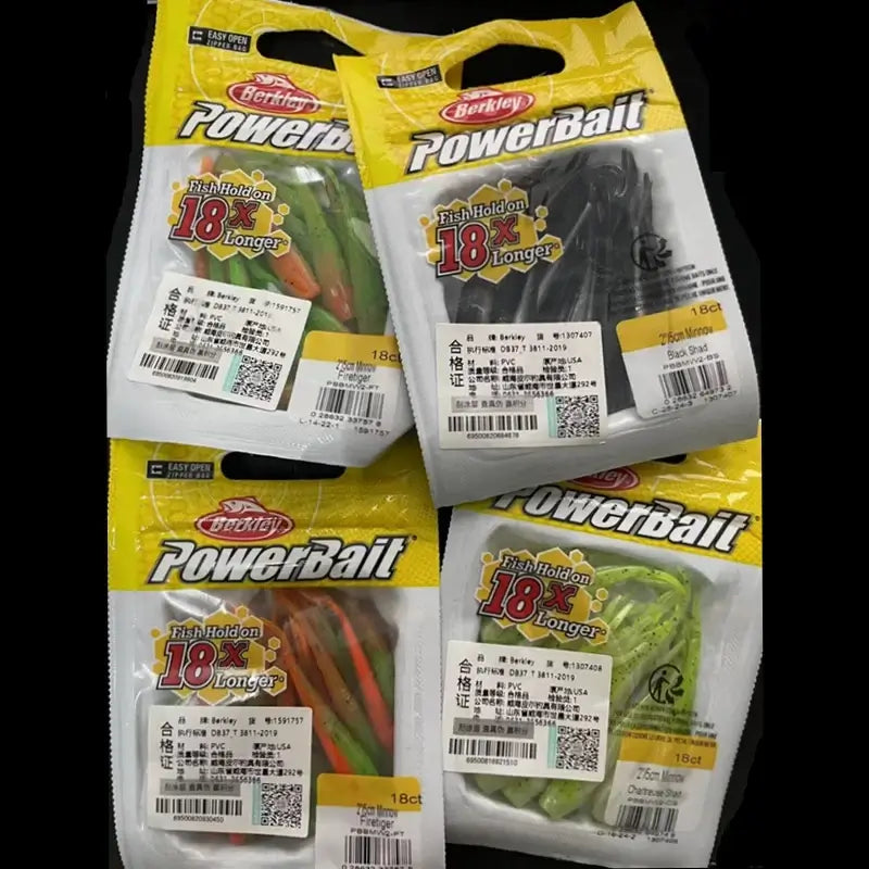 Berkley PowerBait assorted soft baits in packaging, featuring vibrant colors and labels highlighting 18 times scent attraction.