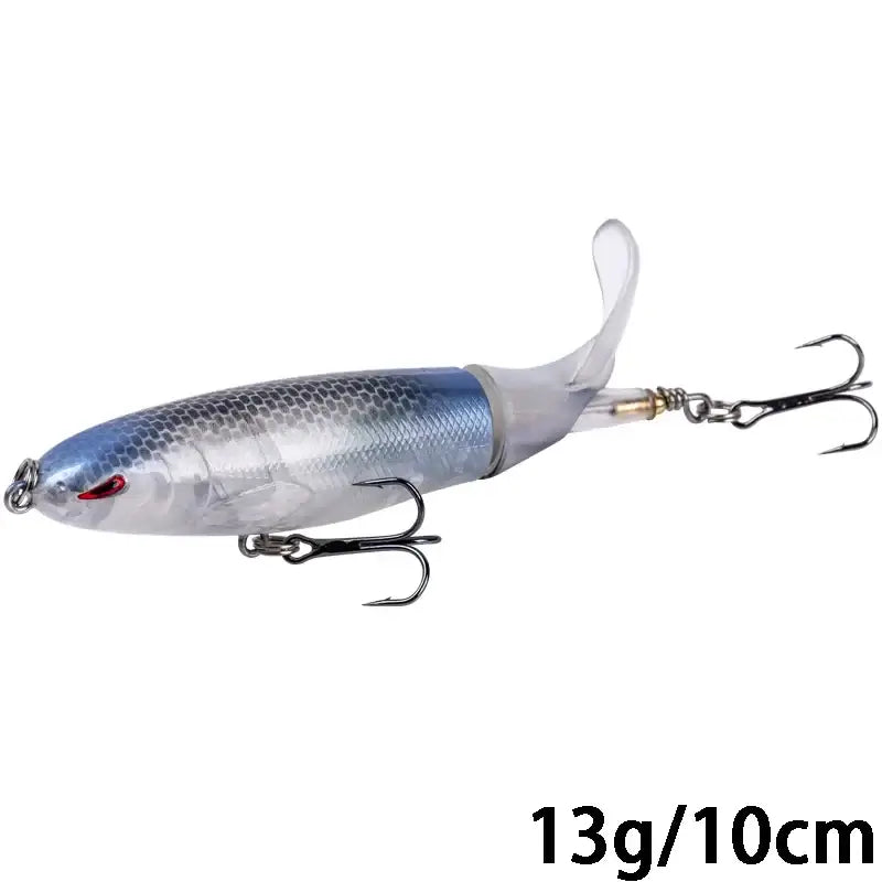 Goture Whopper Popper 10cm topwater fishing lure in silver color with rotating tail and treble hooks.