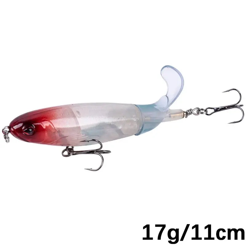 Goture Whopper Popper 11cm topwater fishing lure in transparent design with rotating tail for pike fishing.