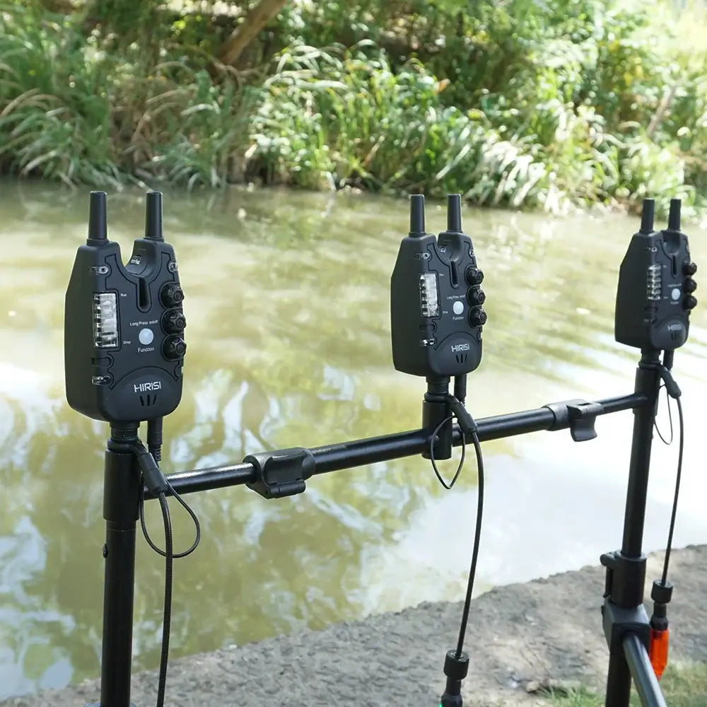 Hirisi Carp Fishing Alarm Set with three bite alarms by the river, designed for efficient bite detection.