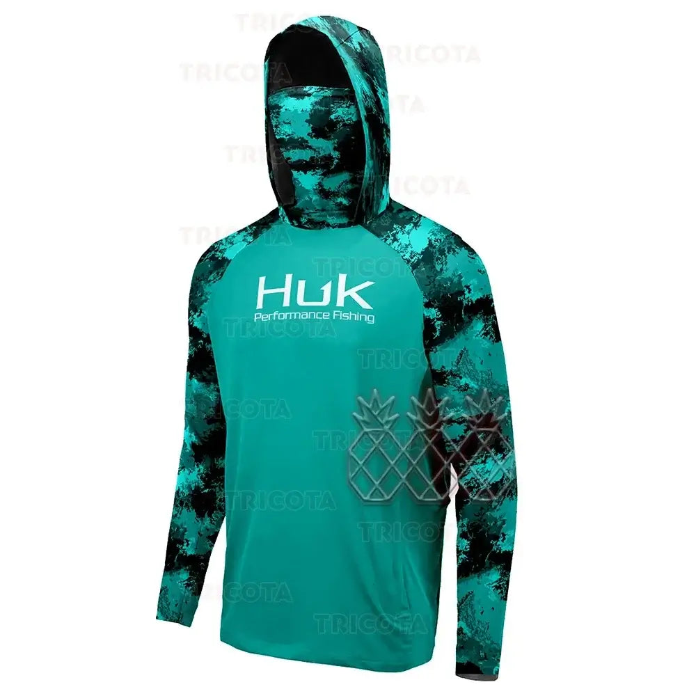 HUK UPF 50+ long sleeve hooded fishing shirt in teal, offering UV protection and quick-dry, breathable fabric.