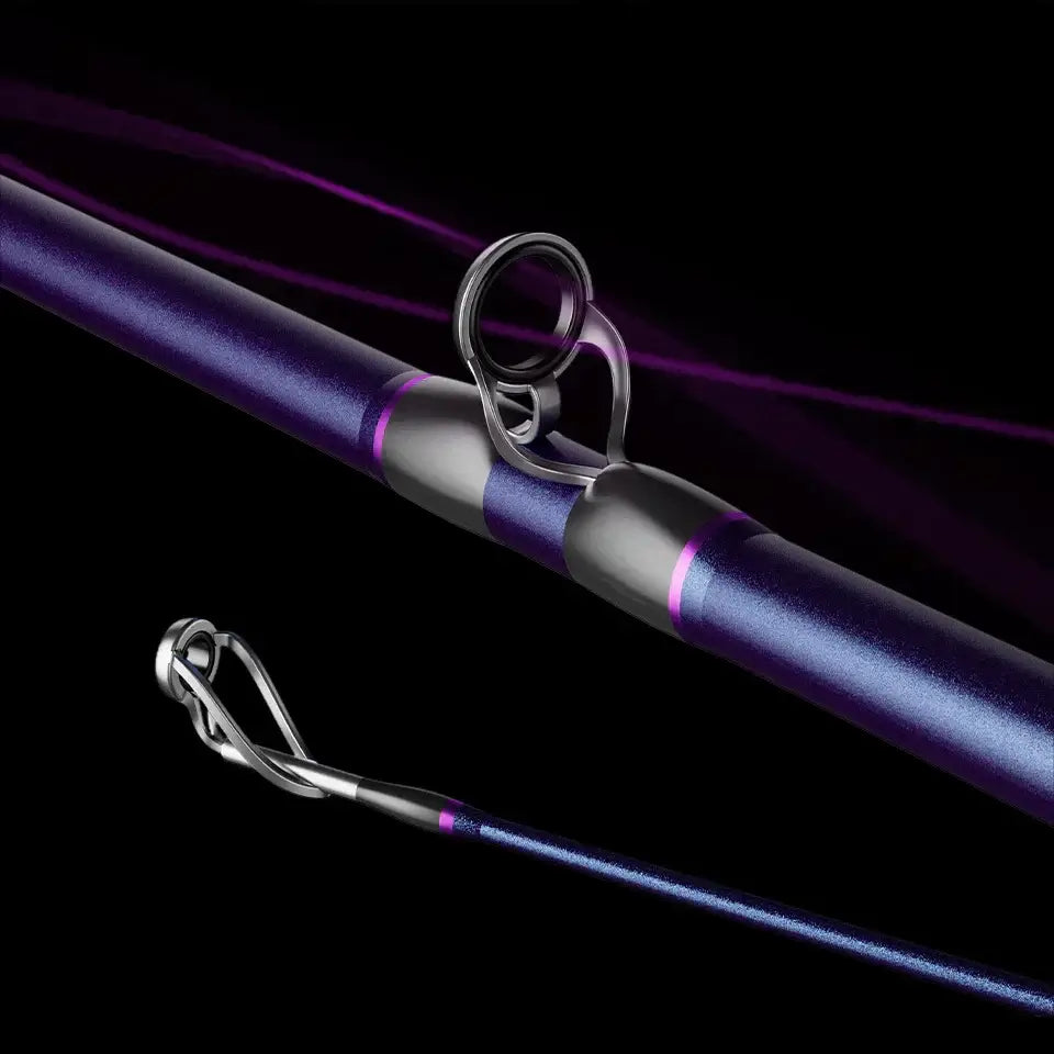 Close-up of KastKing Royale Legend III carbon spinning rod with purple accents and guides, ideal for fishing.