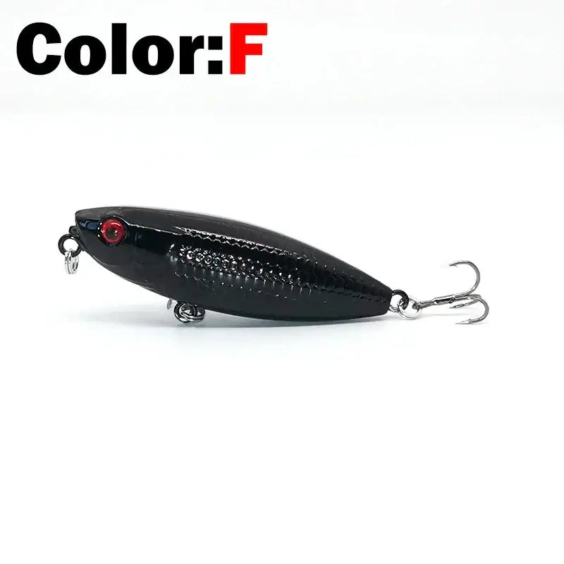 Black floating pencil stickbait lure with red eye, perfect for bass and trout fishing.