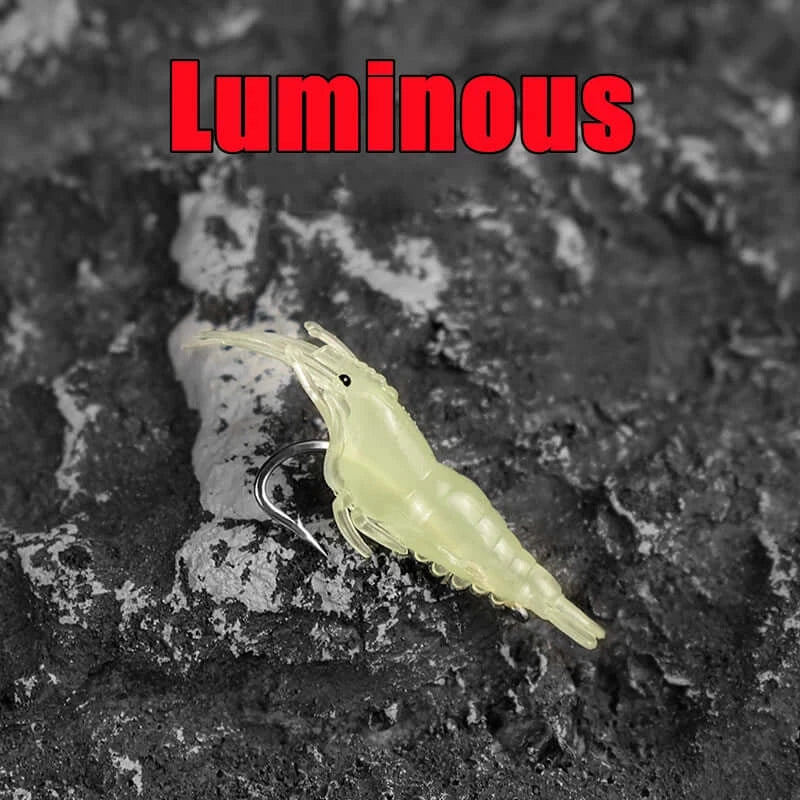 Luminous silicone shrimp bait with hook, designed for effective fishing in low-light conditions.