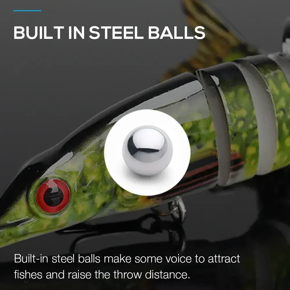 Close-up of TREHOOK bait showing built-in steel balls for improved fish attraction and casting distance.