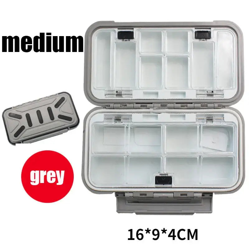 Waterproof fishing tackle box in grey, double-sided opening, multi-compartment design for organizing bait and hooks.
