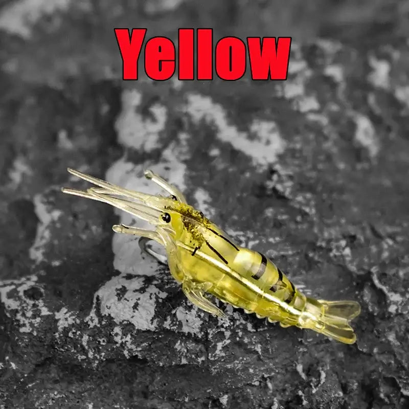 Luminous yellow shrimp silicone artificial bait for fishing tackle, mimics live prey with quality hooks.