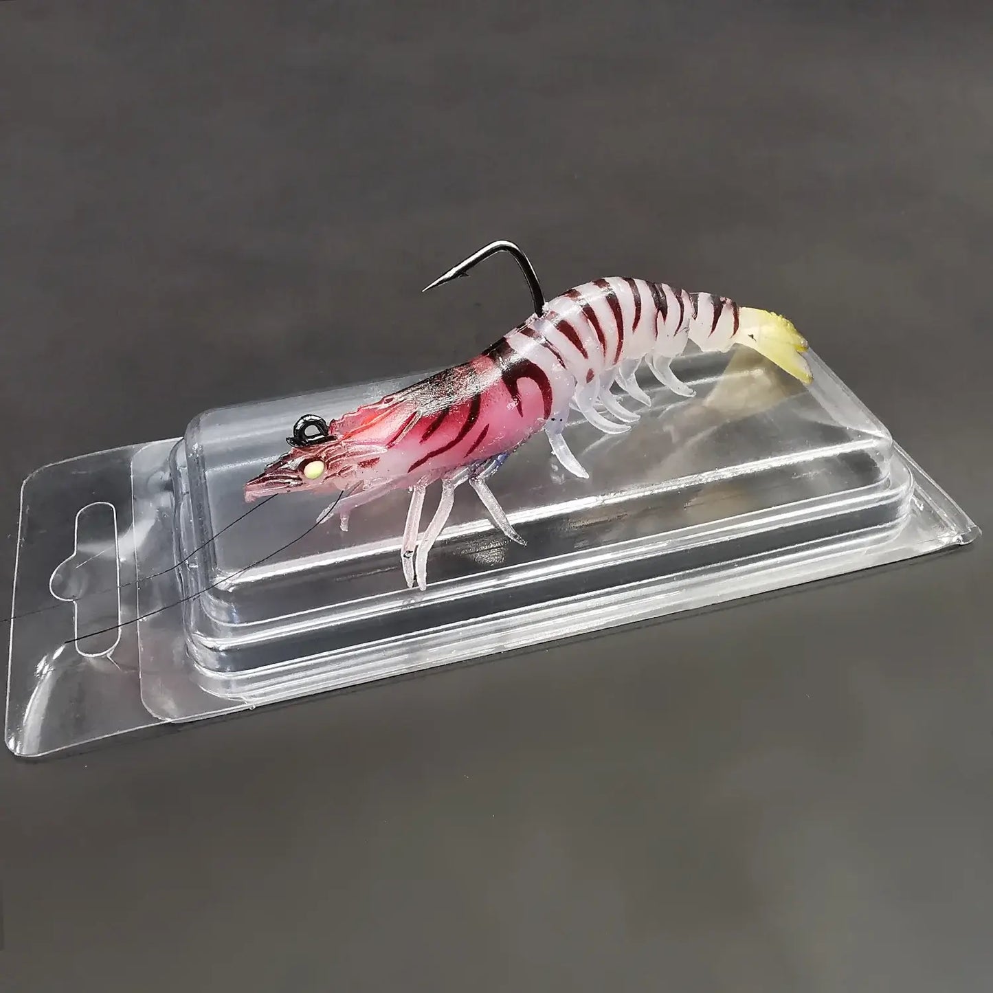 Luminous soft bait prawn fishing lure in packaging, ideal for bass trout walleye fishing.