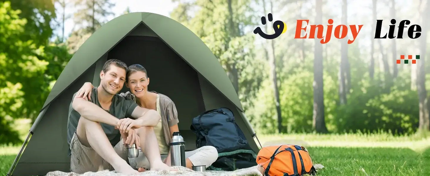 Happy couple enjoying camping life in a waterproof tent surrounded by nature.