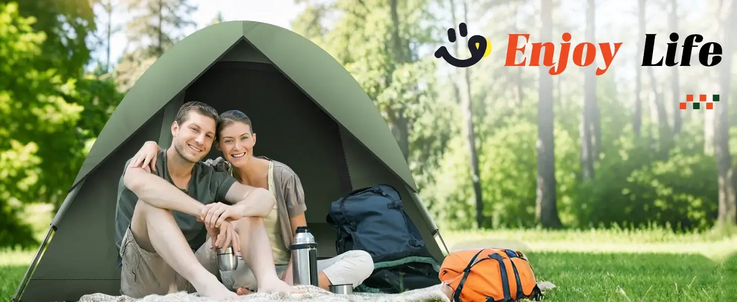 Happy couple enjoying camping life in a waterproof tent surrounded by nature.