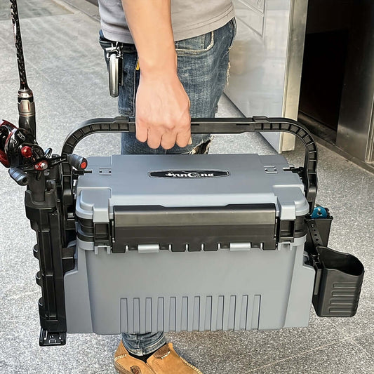 YUNCONG double-layer fishing tackle box set held by a person, showcasing its durable ABS material and waterproof features.